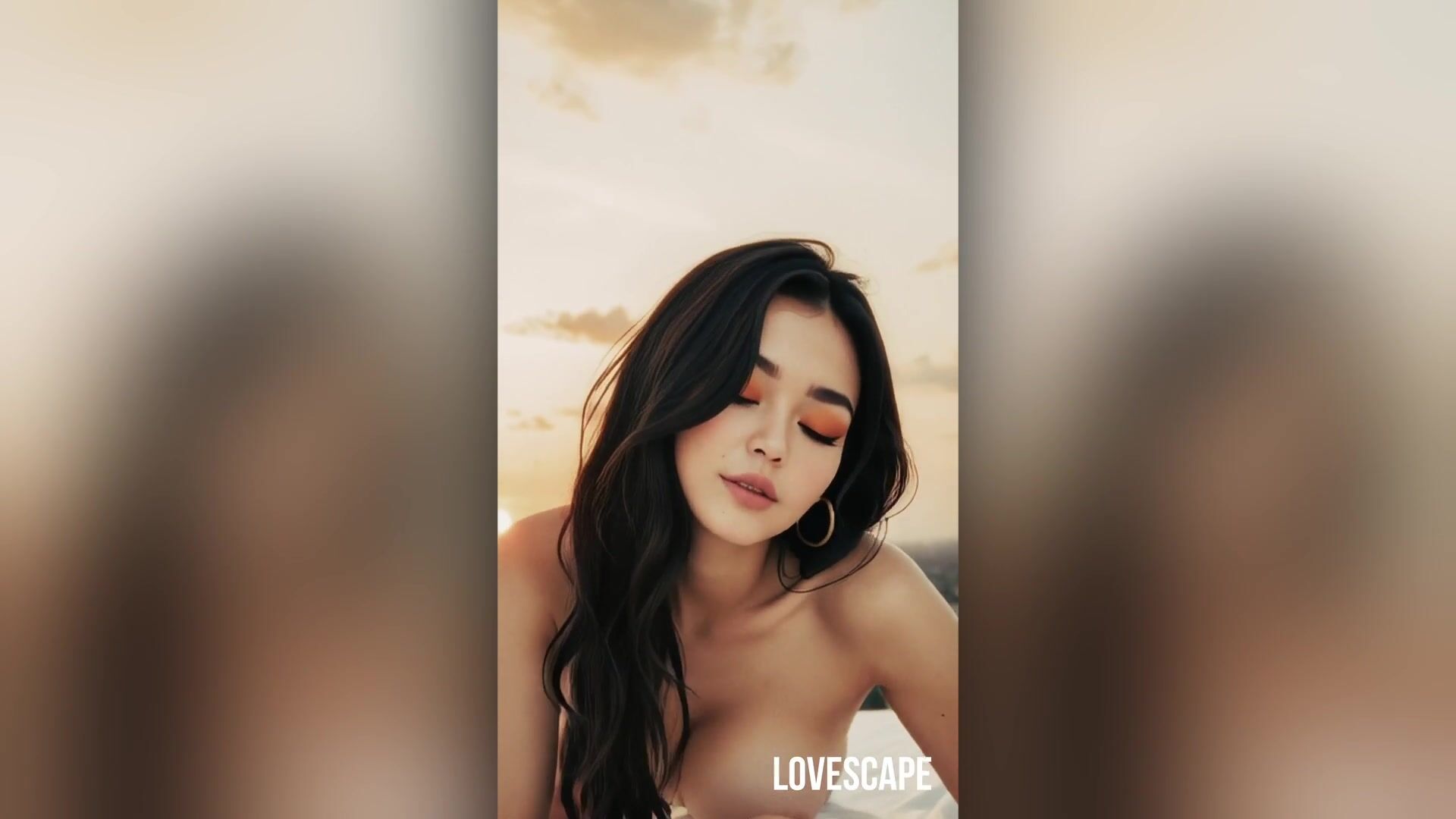 Brunette with perfect bare breasts smiles seductively at sunset